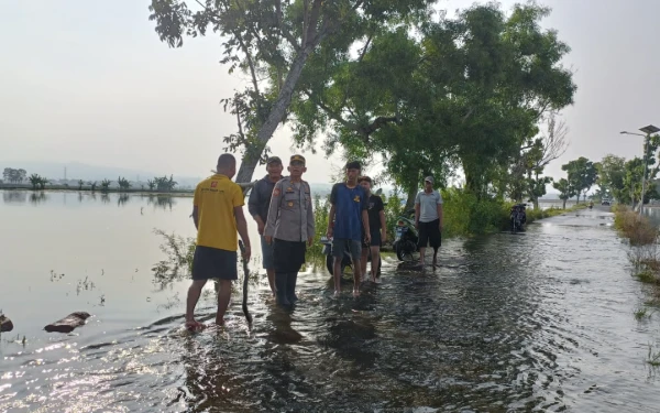 Thumbnail Polres Tuban Turun Tangan Atasi Banjir Plumpang, Kawal Pembukaan Waduk Twist Avur