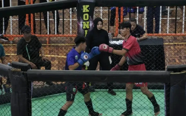 Thumbnail Petarung MMA Kota Batu Sabet Emas di Porprov IX Jatim, Meski Terganggu Kekacauan Jadwal