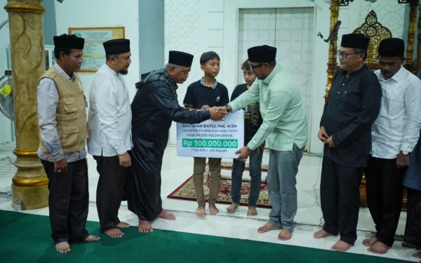 Thumbnail Berita - Anak Yatim Nagan Raya Terima Santunan Rp300 Juta dari Safari Ramadan Aceh
